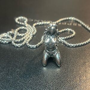 Sterling Silver Kneeling Figure Pendant Necklace - Silver